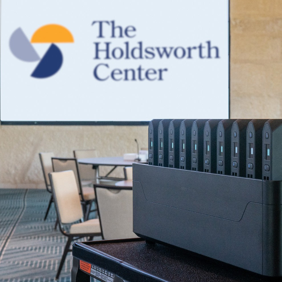 Omnicharge Power Station in front of The Holdsworth Center sign