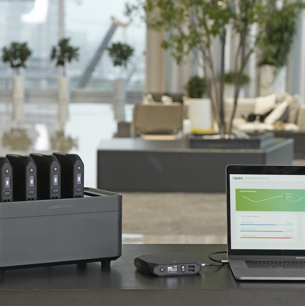 Omni Power Station next to a laptop
